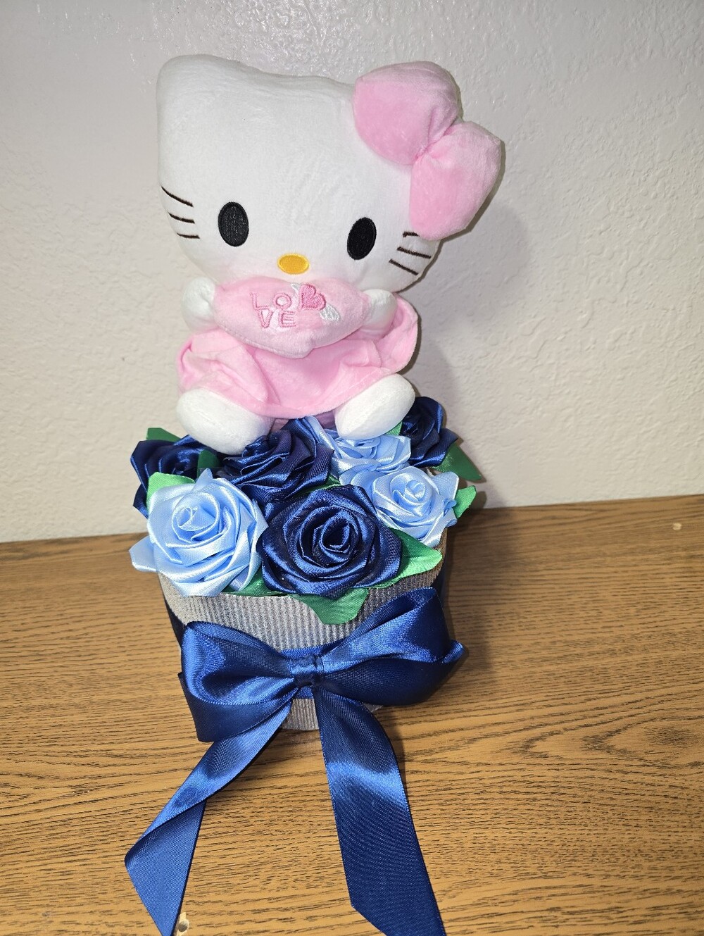Hello Kitty Plush in White and Pink with Blue Rose Arrangement